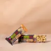 Das Bild zeigt 2 Tafeln Schokolade, Erdnüsse und Mandel von NutriPur