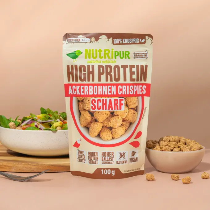 Bild zeigt die scharfen Ackerbohnen Crispies in Snack-Schalen
