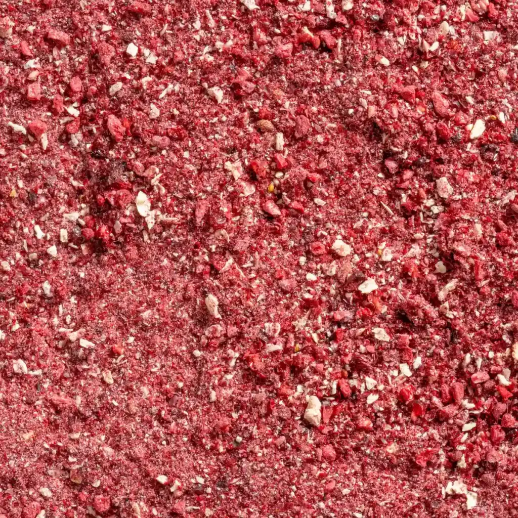 Ein Bild zeigt eine Makroaufnahme des gefriergetrockneten Multi Vital-Fruchtpulvers von Nutripur