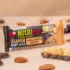 Detailbild des Nussriegel mit Mandel, Erdnuss und Schoko im Vordergrund