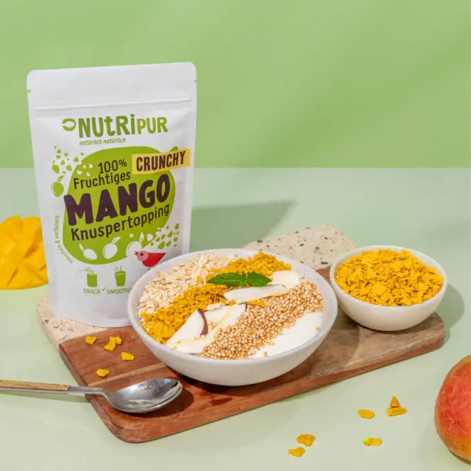 Bild zeigt Crunchy Mango Topping im Müsli