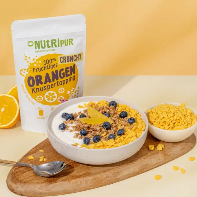 Bild zeigt Crunchy Orange Topping im Müsli