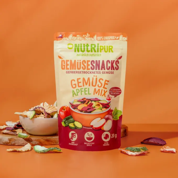 Bild zeigt Gemüsesnack Gemüse-Apfel-Mix in Schalen liegend