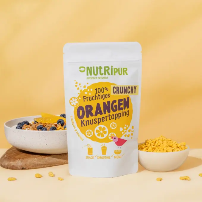 Bild zeigt Crunchy Orange Topping in Schalen liegend