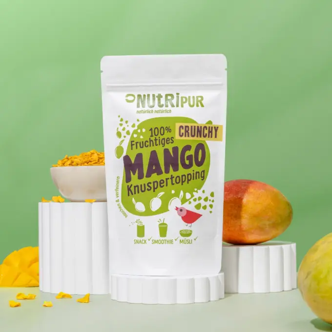Detailbild der Verpackung und des Crunchy Mango Toppings