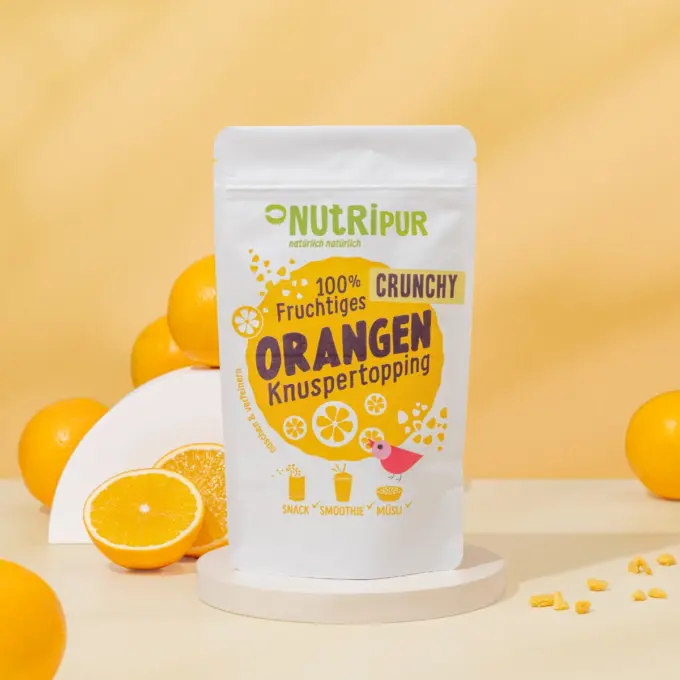 Detailbild der Verpackung und des Crunchy Orange Toppings