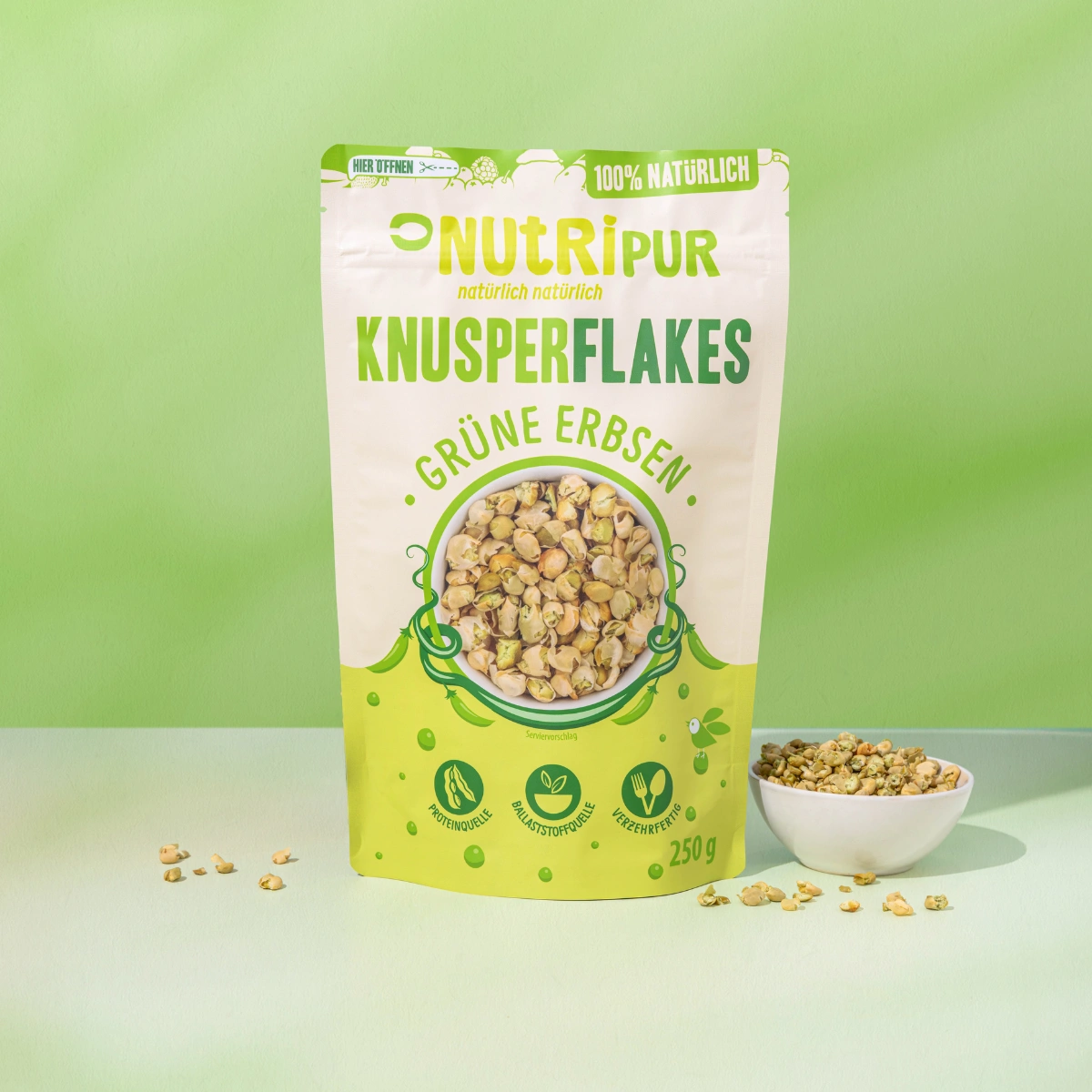 Hier ist ein Produktbild der grünen Erbsen-Knusperflakes von Nutripur