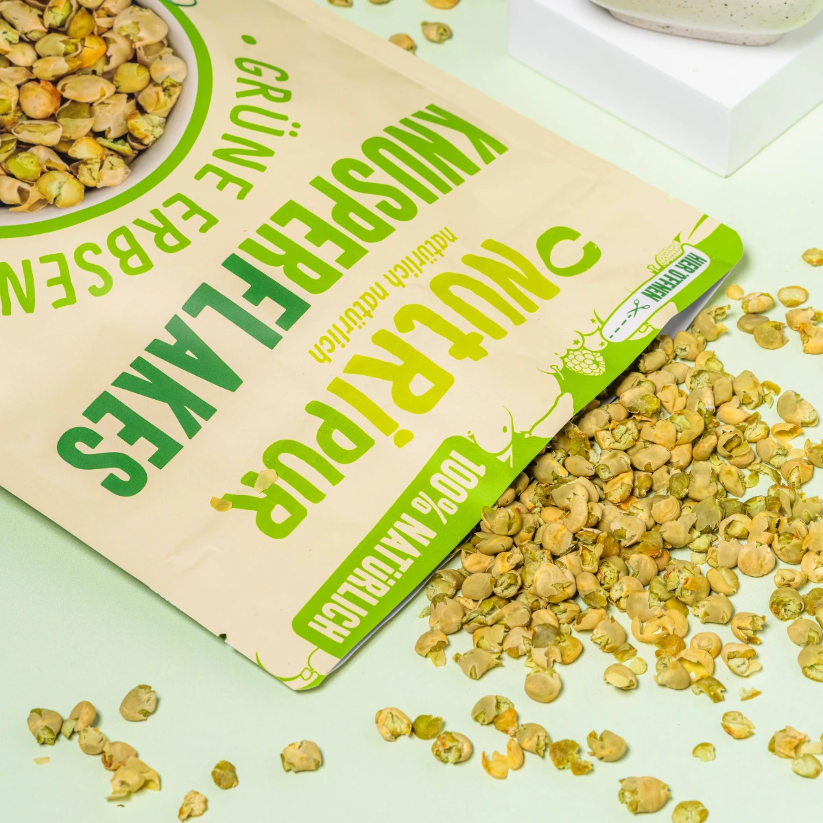 Bild zeigt Verpackung mit Grüne Erbsen-Knuspertopping